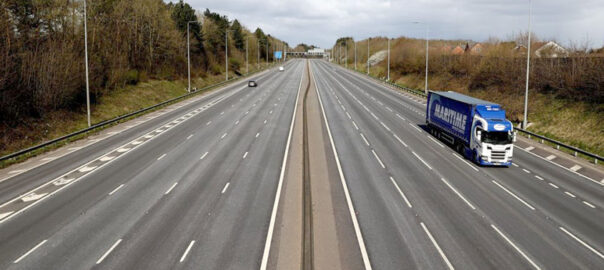 Empty UK motorway as a result of the COVID-19 impact on travel