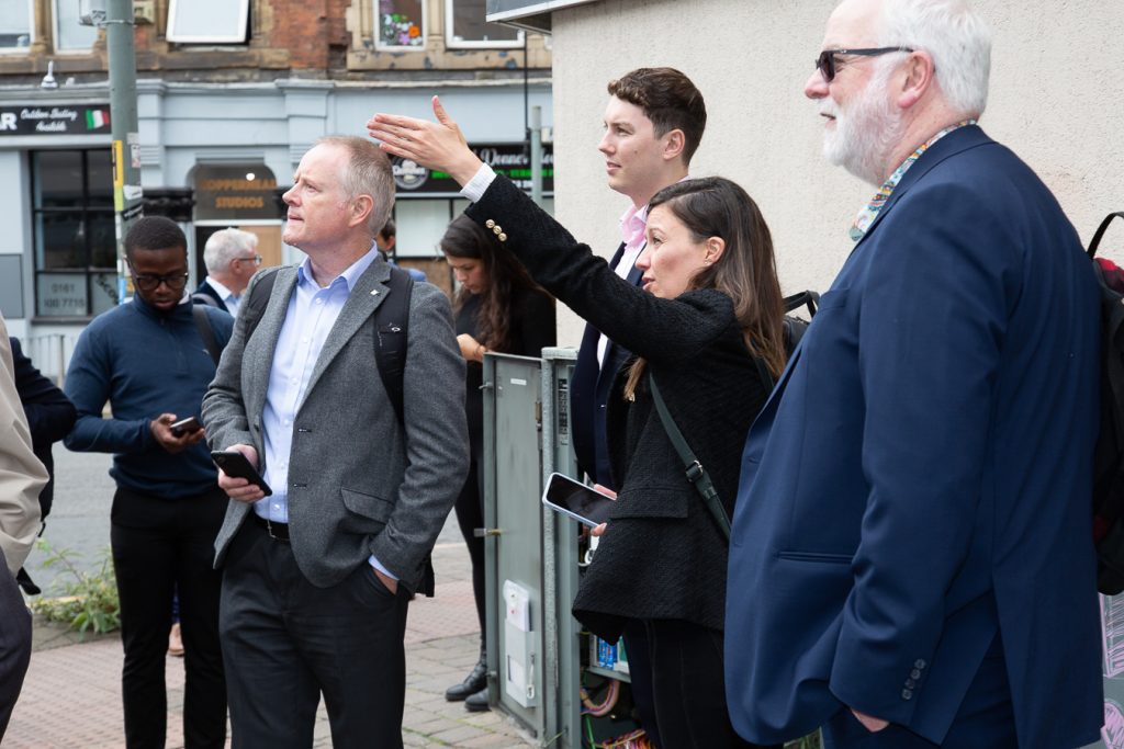 Image of the walking tour group of people at the Smart Junctions at the Viva SJ5G showcase event