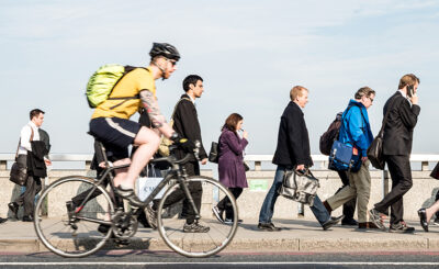 Image of modal shift evidence with pedestrians and cyclist over bridge in London