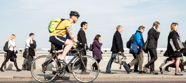 Image of modal shift evidence with pedestrians and cyclist over bridge in London